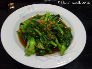 Some veggie... Think it's kailan?