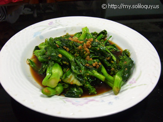 Some veggie... Think it's kailan?